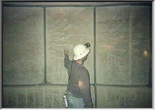 Stone miner at a newly cut face Stone miner at a newly cut face
