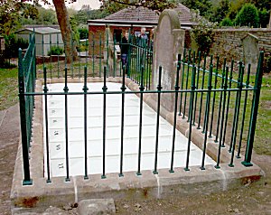 End view of the newly restored grave