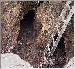Crater dug to intersect arch of tunnel