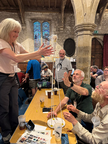 Club members building the Saturday night egg tower